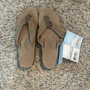 Women’s size 10 NWT Rainbow flip flops.